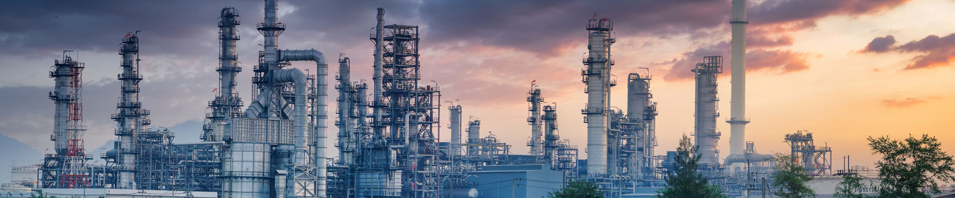 oil refinery close up at dawn
